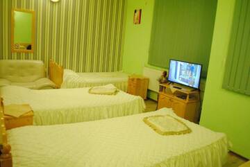 Фото номера Трехместный номер-студио с мини-кухней Отель Hotel Svishtov г. Свиштов 3